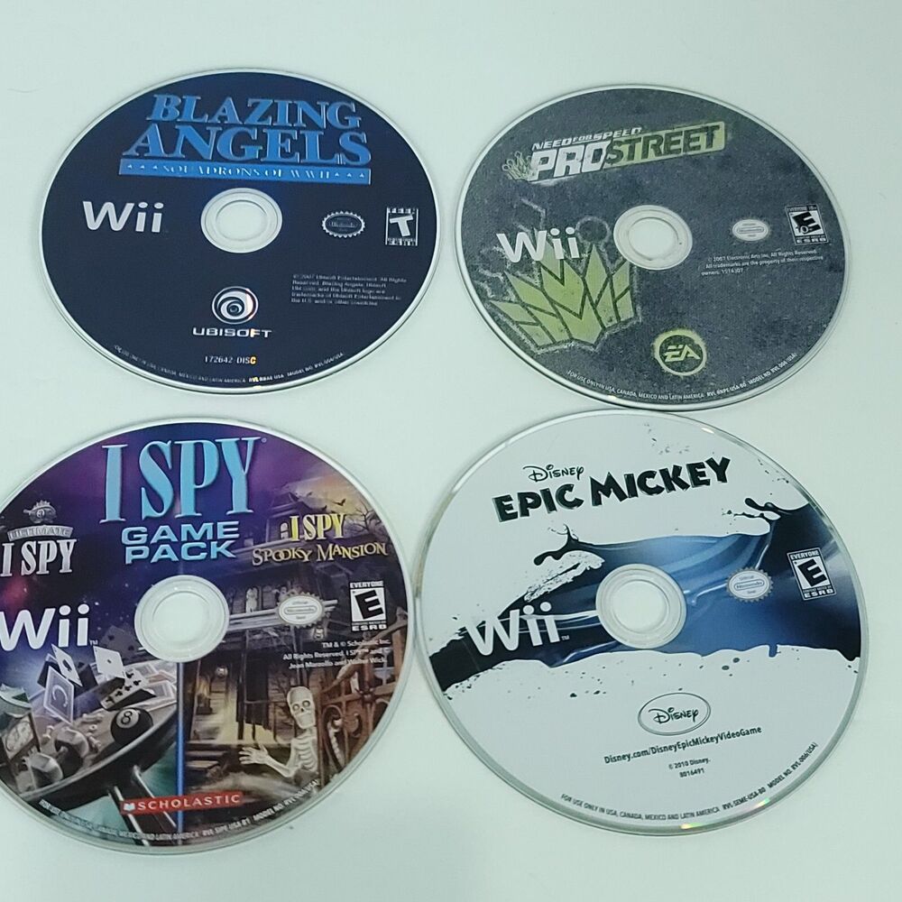 Nintendo Wii Games Lot of 4 Bundle Epic Mickey I Spy Blazing Angels Pro street